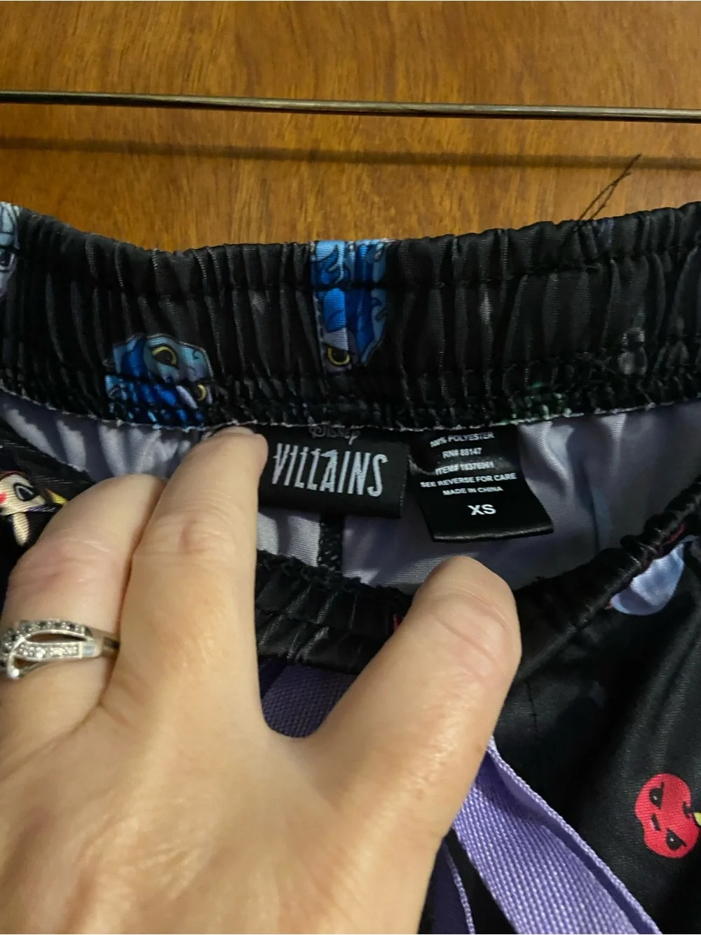 Disney Black Pajama Pants with Multicolor Space Characters and Purple Drawstring - Picture 3 of 3